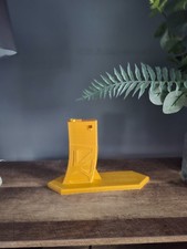 M4 Airsoft stand. Large gold stand. New fits all M4 rifles