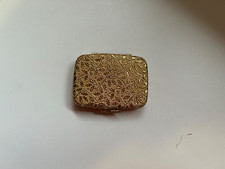 Revlon powder compact.