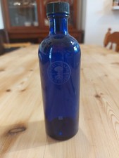 VINTAGE NEALS YARD REMEDIES COVENT GARDEN BLUE GLASS BOTTLE ADVERTISING