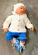Hand knitted newborn baby boy