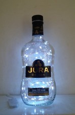 Up cycled Jura Whiskey bottle with battery operated 40 White leds, table lamp