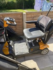 Rascal Vista DX 4 Mph 4yrs Old From Brand New Burnt Orange Colour. Like  new 