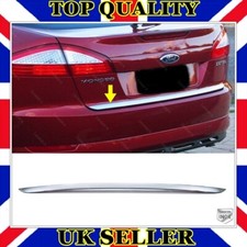 Chrome rear trunk bottom trim - rear,