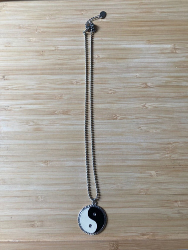 Claires yin and yang necklace - yin,