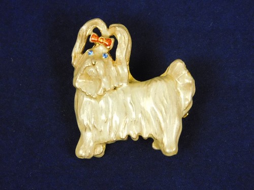 Gold tone enamel female - &,