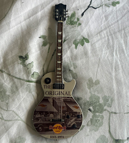 Hard rock cafe guitar - hard, guitar-shaped