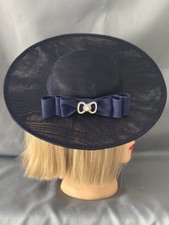 Stunning navy blue hatinator with white bow 