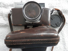 Vintage Minolta Hi-Matic 7 35mm camera Seikosha LA lens Skylight 1A Filter 55mm