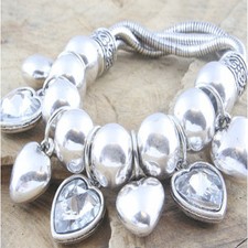 Elasticated Charm Bracelet with facetted and heart shape charms Special Offer