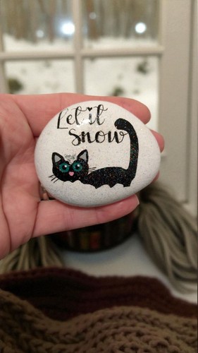 Let snow black cat in - "let,