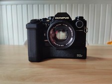 Olympis Om 10 35mm Film Camera + zuiko 50mm f1.8 lens and Olympus Winder Om-1TR