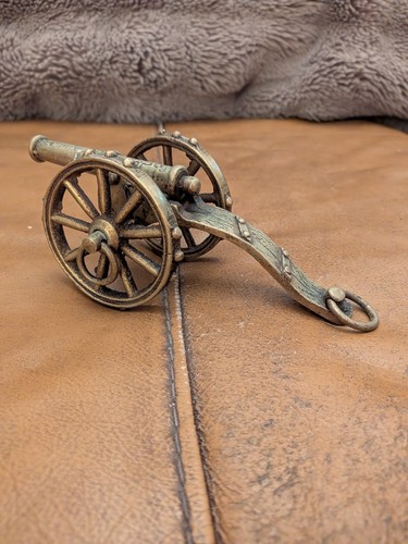 Vintage brass cannon moving - vintage,