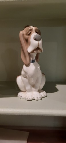 Sitting sad dog figure - sitting, by