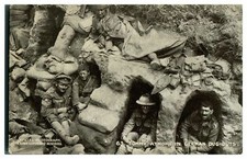 Antique WW1 military printed postcard Tommy at home in German Dug Outs