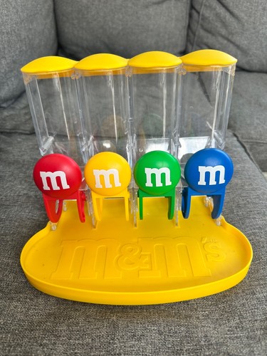 World four tube dispenser - m&ms,