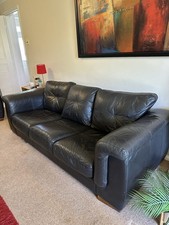 Leather Settee And Matching