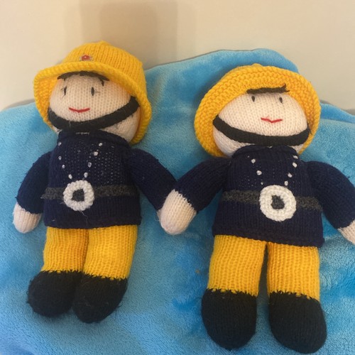 Hand knitted fireman - hand,