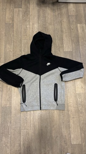 Grey and black nike tech - and,