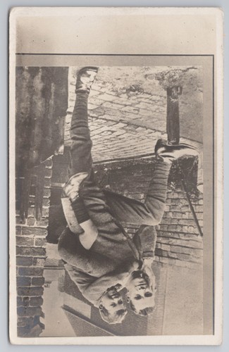 Rppc man giving boy piggyback - man,