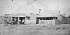 Durham Ox, Victoria, 1875 A group of people in front of a general sto Old Photo