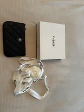 Chanel Classic Poach In Black