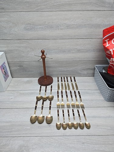 Brass and wooden handle - and,