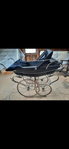 Silver cross pram with - cross, sun