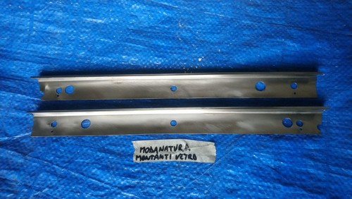 Pair profile moulding - of,