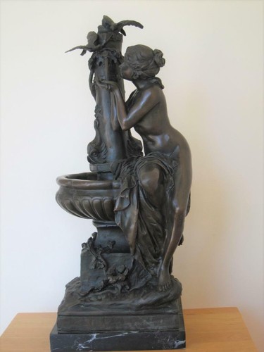 Nude girl drinks water from - nude,