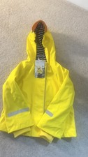 child’s duck yellow raincoat