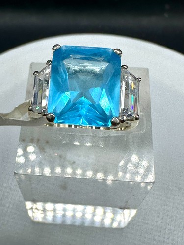 Emerald cut ring blue