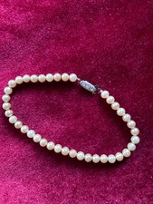 Vintage faux pearl bracelet with silver and diamante clasp