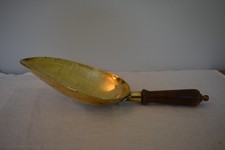 Vintage large brass scoop, turned wood handle.