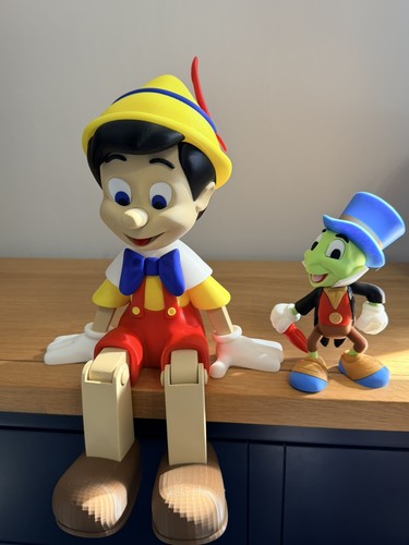 Pinocchio and jiminy cricket - and,