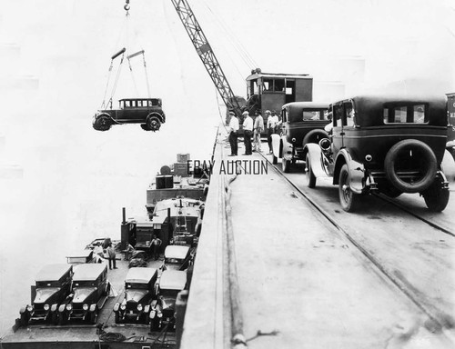 Moon car lowered onto river - lowered,