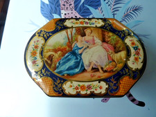 A  JOB LOT OF BUTTONS IN AN OLD FILLERYS TOFFEE TIN