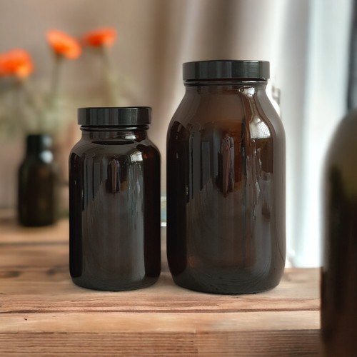 Amber glass pill jars - jars, with