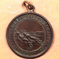 1933 ROYAL LIFE SAVING SOCIETY BRONZE CASED MEDAL: I. D. M. HARRIS (#8970)