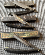 Three Antique Straight Razors