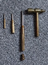 VINTAGE BRASS HAMMER WITH NESTING SCREWDRIVERS..GOOD CONDITION 
