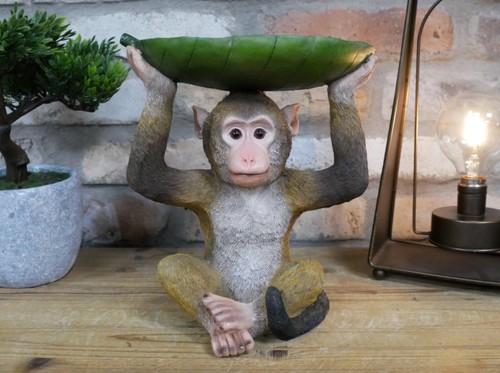 Quirky resin monkey - with, leaf