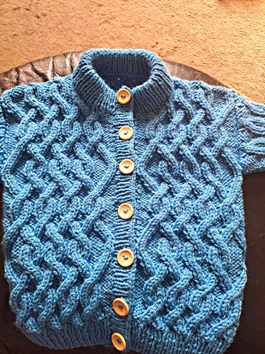 Hand knitted cable knit - knitted, button