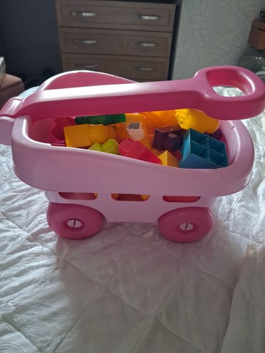 Pink pull along truck with - along,