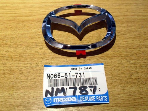 Front wings bonnet badge