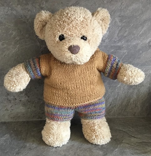 Hand knitted teddy - hand,