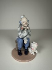 Cornerstone Resting Clown Holding Flower Next to Dog Figurine Damaged Petals