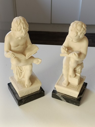 Pair reading boy bookends - of,