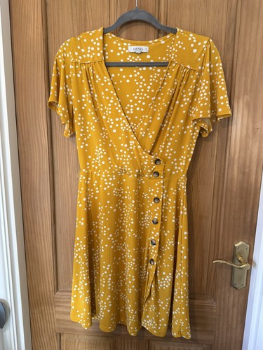 Mustard and white swing - and,