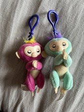 Fingerling monkey keyring keychains. Pink and turquoise.