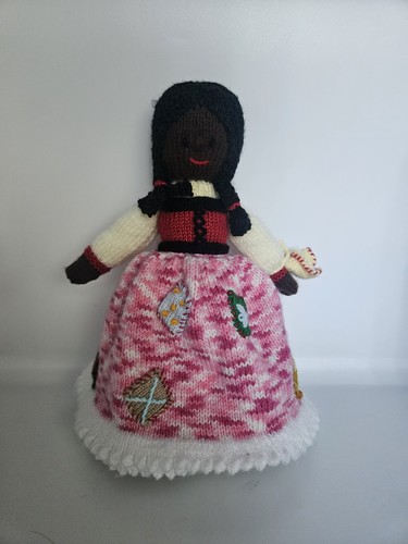 Hand knitted topsy turvy doll - hand,